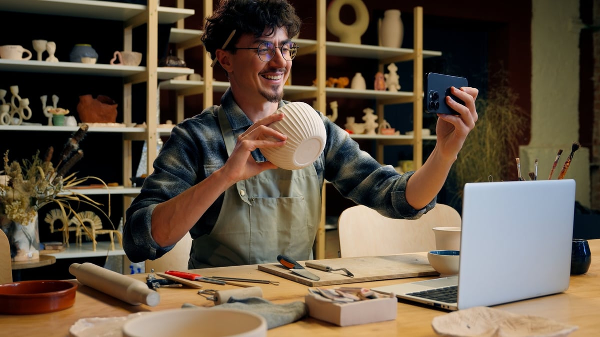 Small business owner reaching customers through AI search