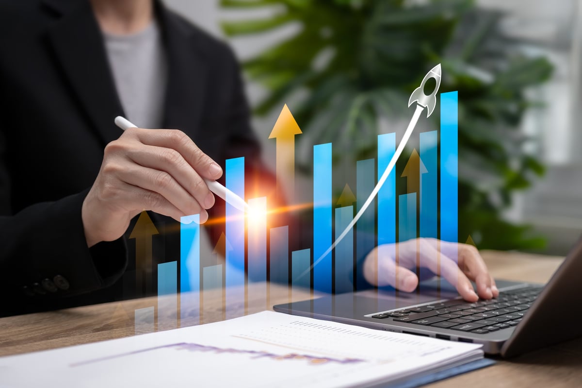 Businesswoman showing a graph analyzing financial performance with charts